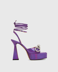 Rina Crystal Bow Lace Up Platform Flared Sandals In Purple