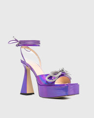 Rina Crystal Bow Lace Up Platform Flared Sandals In Purple