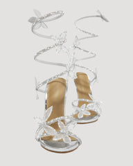 Zana Rhinestone Bow Snake Sandals In Silver