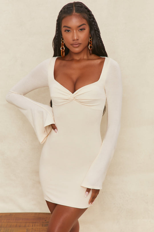 Wildest Dreams Flare Sleeve Mini Dress In cream