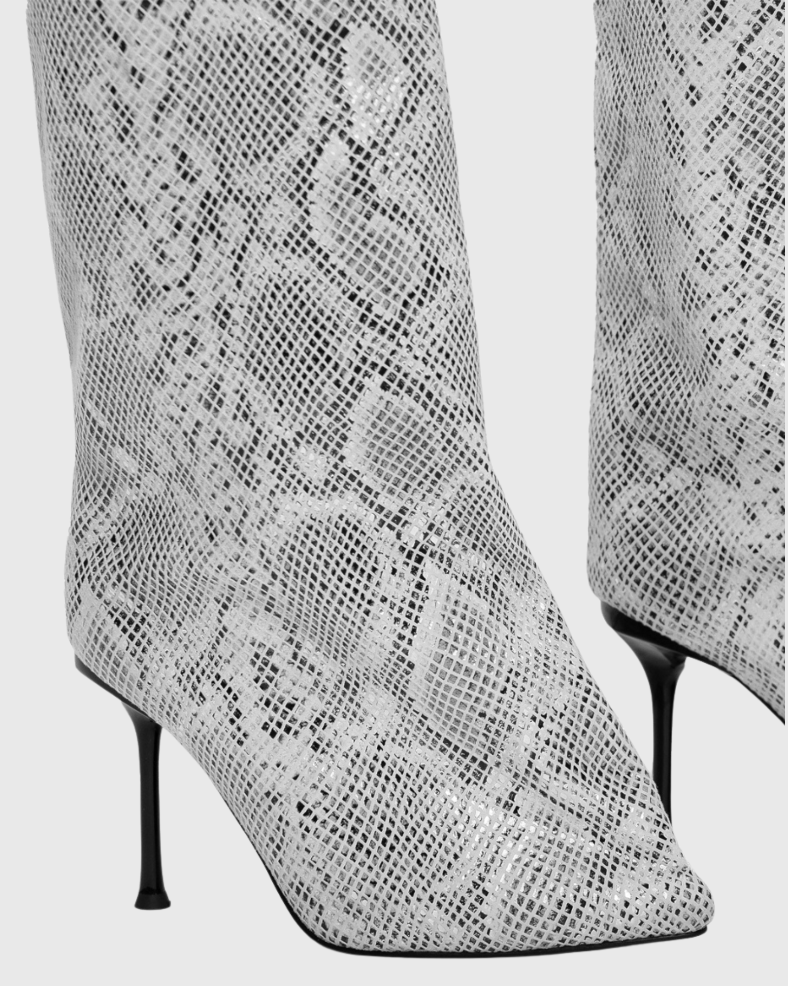 Angiola Slash Flare Knee High Boots In Snake