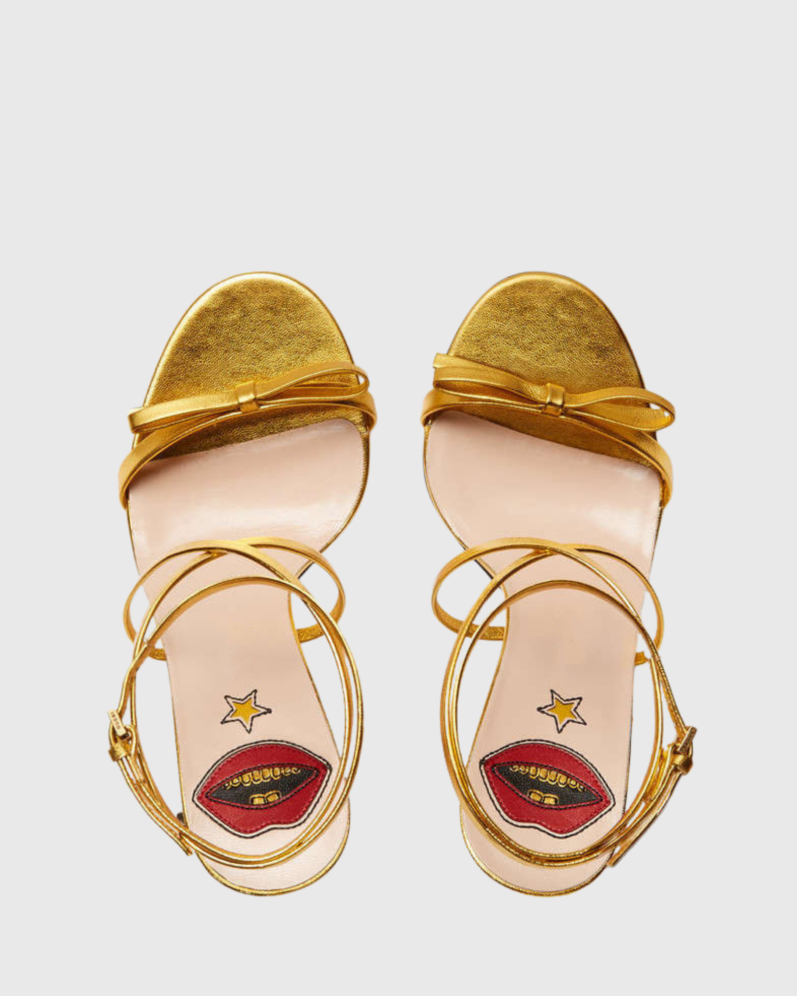 Noor Cross Snake Spiral Heels In Gold