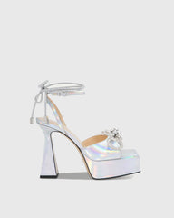 Rina Crystal Bow Lace Up Platform Flared Heels In Silver