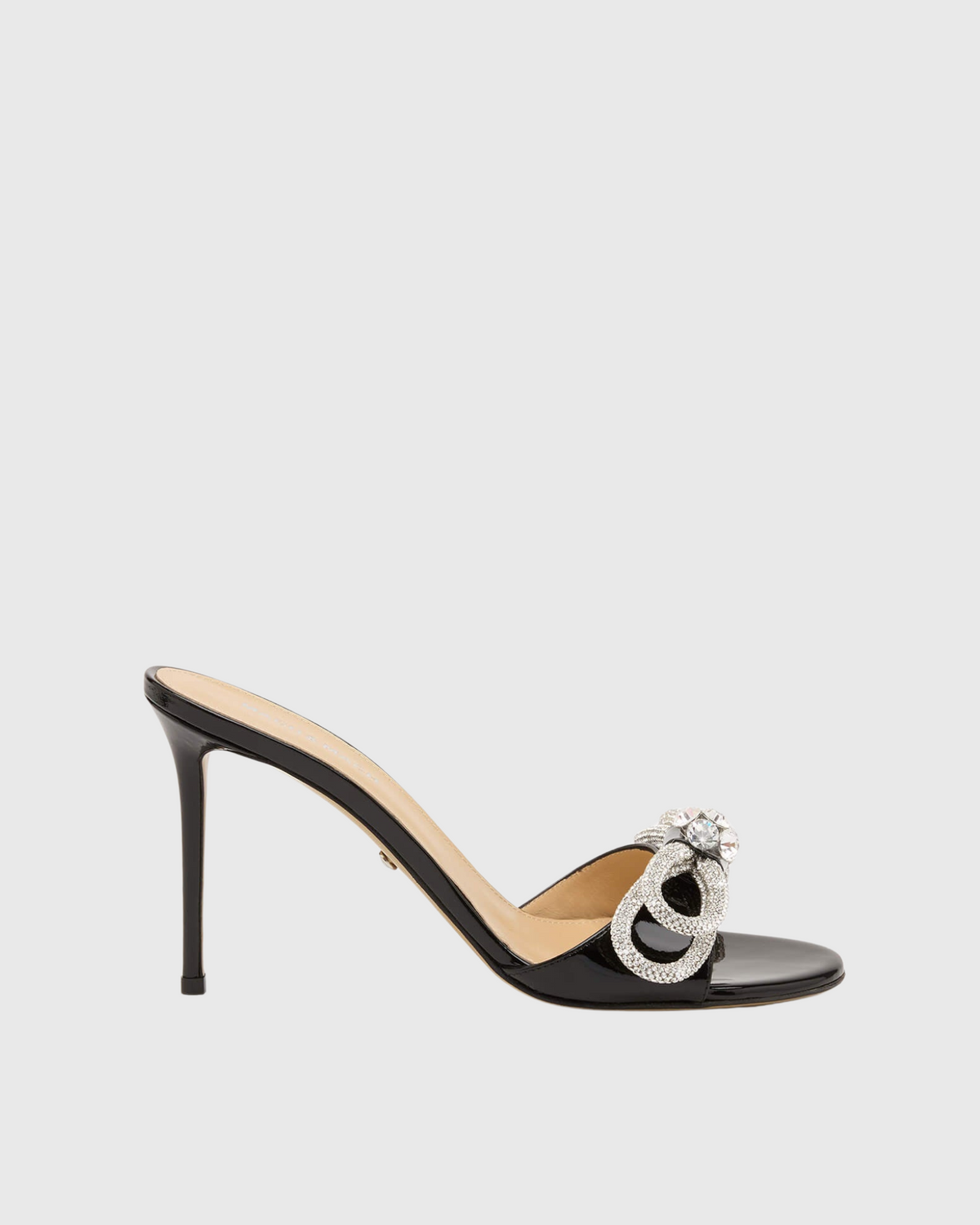Rina Crystal Bow Patent Leather Mules In Black