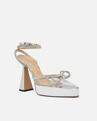Rina Crystal Bow Platform Flared Heels In Silver