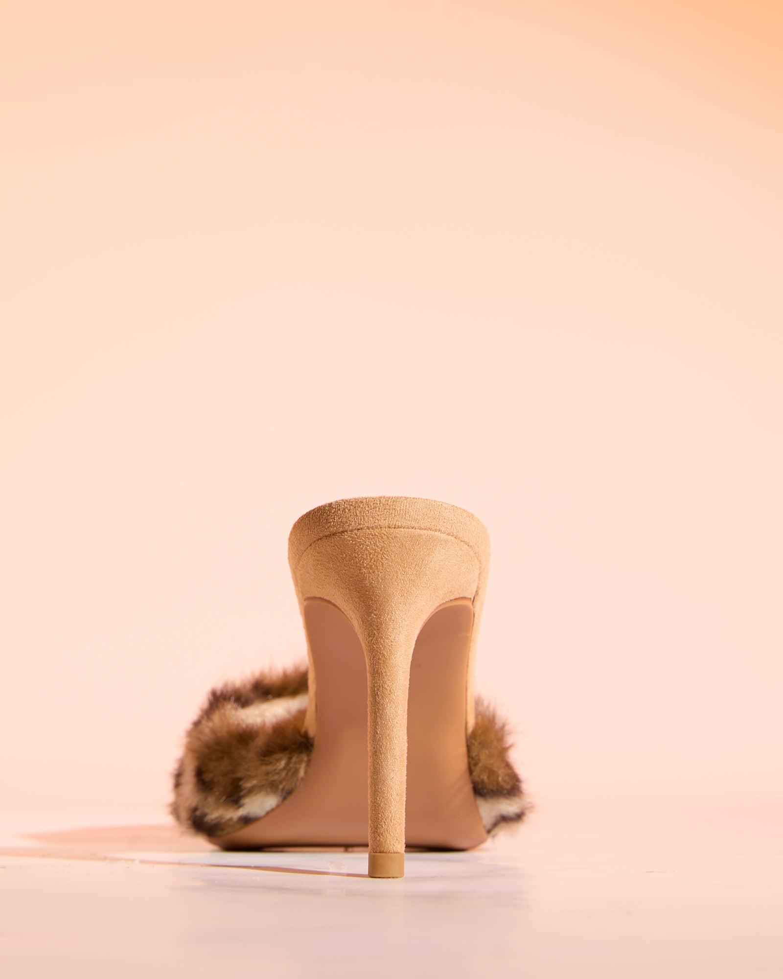 Vallea Faux Fur Slippers In Leopard