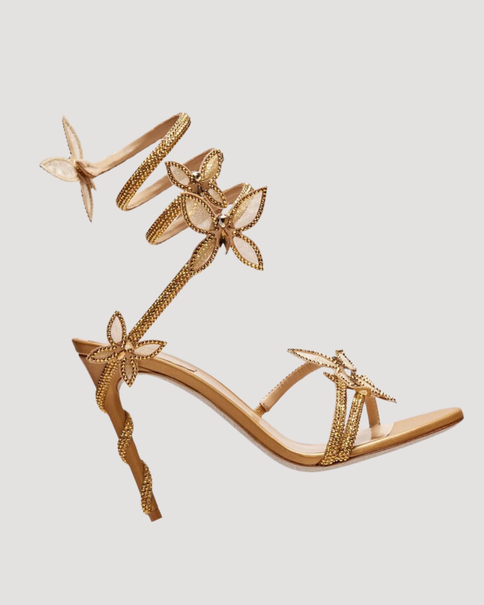 Zana Rhinestone Bow Snake Sandals In Gold