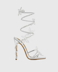 Zana Rhinestone Bow Snake Sandals In Silver